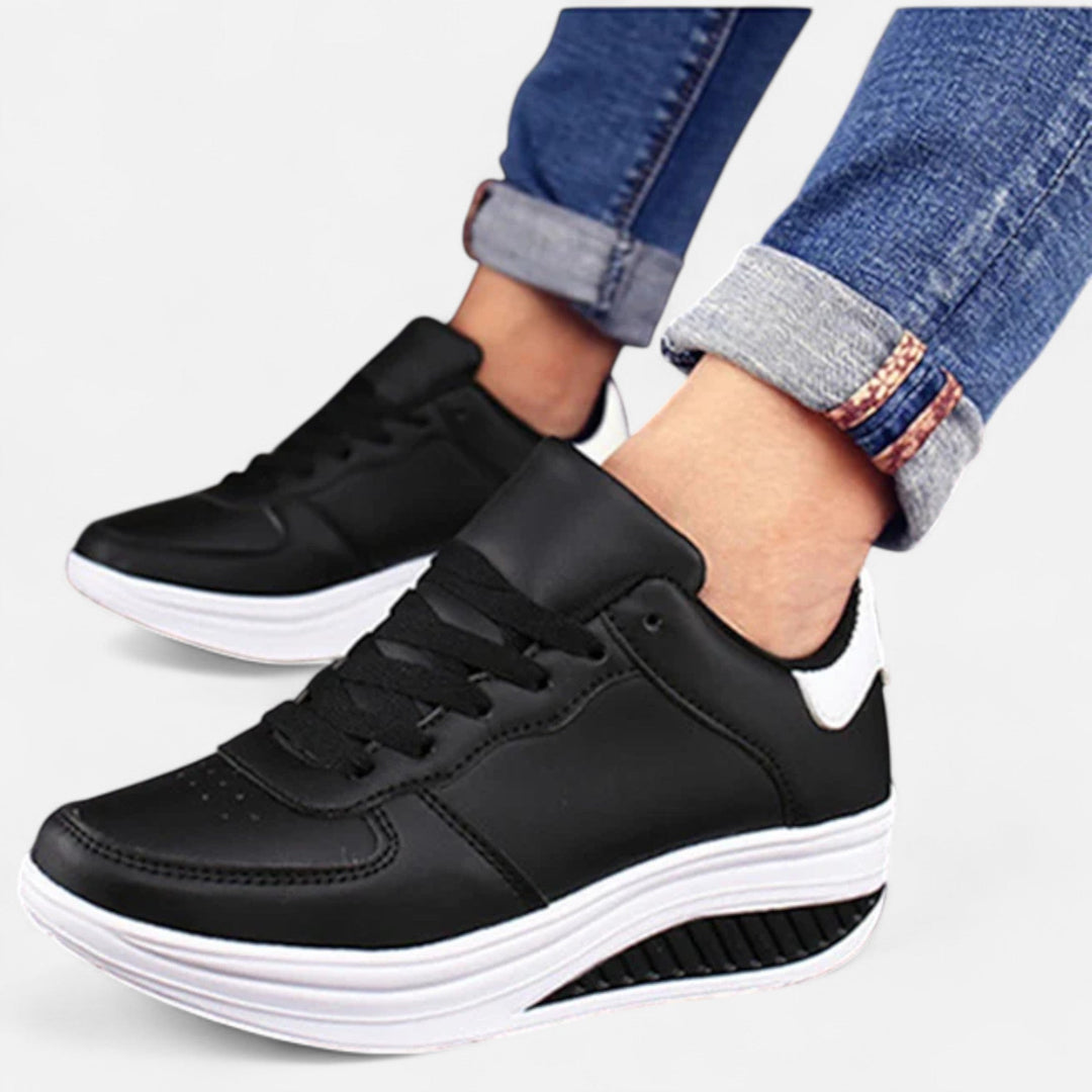 Sneakers con zeppa in pelle da donna