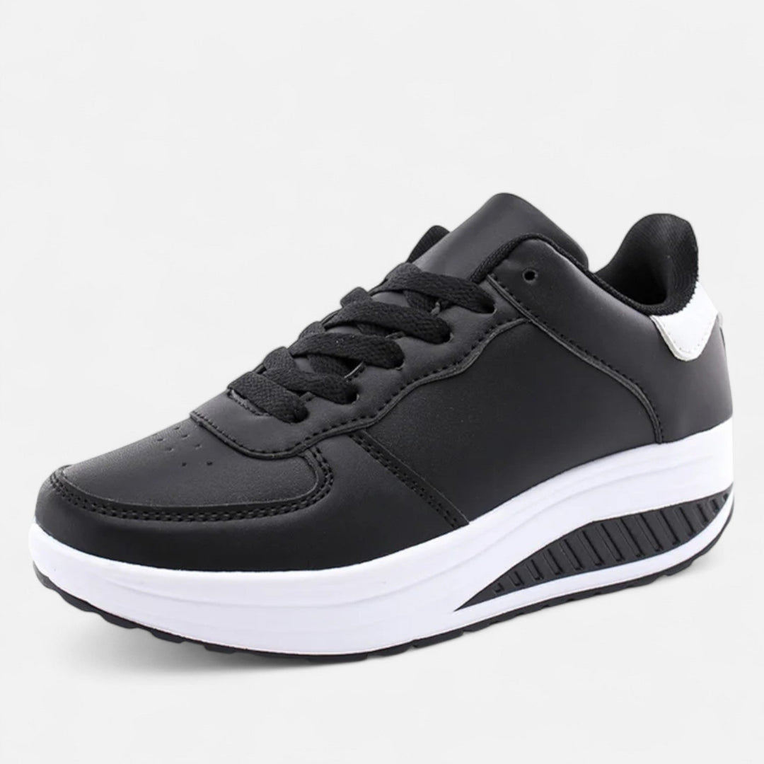 Sneakers con zeppa in pelle da donna