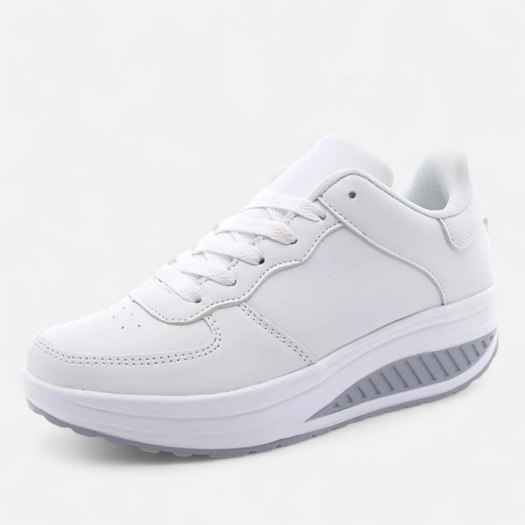 Sneakers con zeppa in pelle da donna