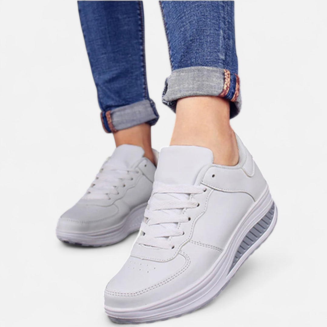 Sneakers con zeppa in pelle da donna