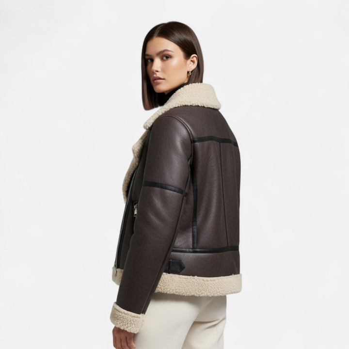Giacca in pelle autunnale da donna con cintura